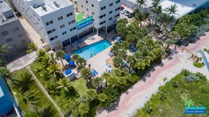 Outdoor pool, open 8:00 AM to 7:00 PM, pool umbrellas, pool loungers