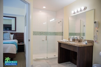 Premium King Suite | Bathroom | Shower, eco-friendly toiletries, hair dryer, towels at Crystal Beach Suites Miami Oceanfront Hotel