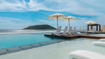 Outdoor pool, open 8:00 AM to 9:00 PM, pool umbrellas, pool loungers