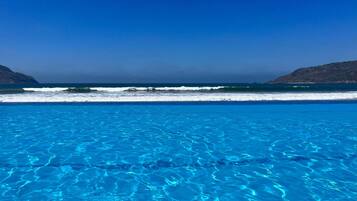 Outdoor pool, open 8:00 AM to 9:00 PM, pool umbrellas, sun loungers