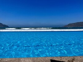 Outdoor pool, open 8:00 AM to 9:00 PM, pool umbrellas, sun loungers