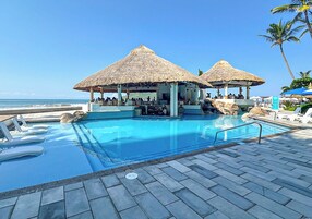 Outdoor pool, open 8:00 AM to 9:00 PM, pool umbrellas, sun loungers