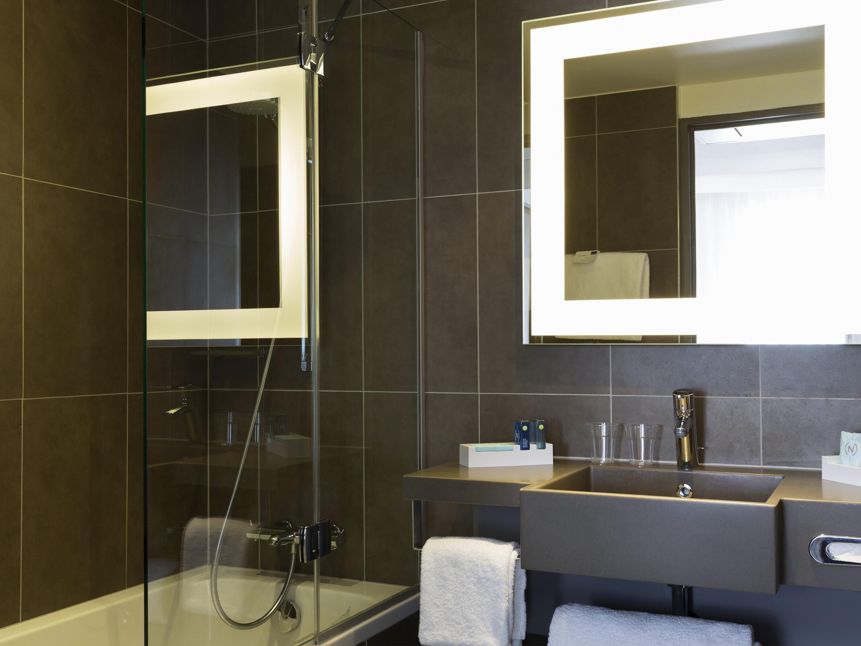 Eco-friendly toiletries, hair dryer, towels, soap