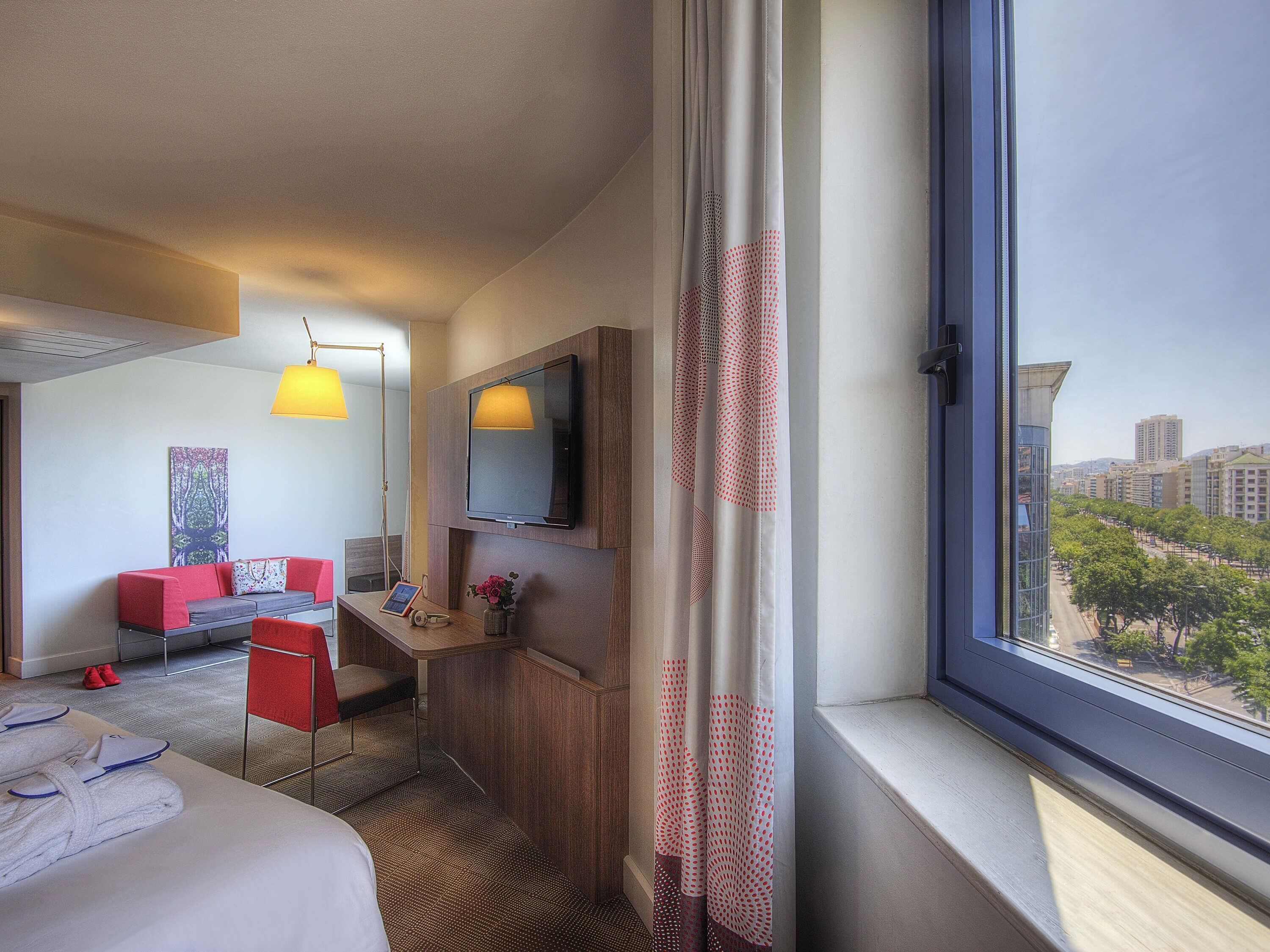 Habitación ejecutiva, 1 cama Queen size | Ropa de cama de alta calidad y artículos del minibar gratis 