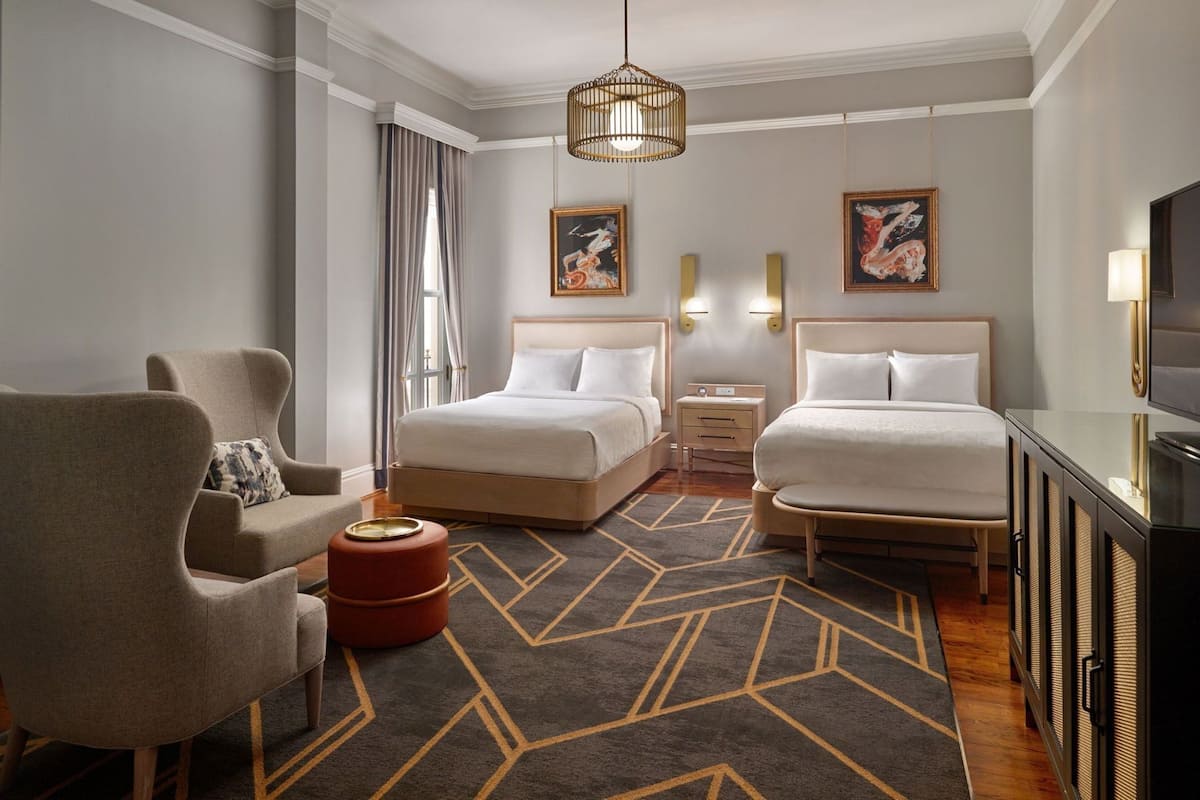 Premium bedding, pillow-top beds, in-room safe, laptop workspace