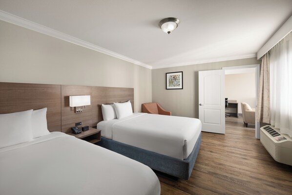 Suite, Multiple Beds, Non Smoking | Desk, blackout drapes, iron/ironing board, free WiFi