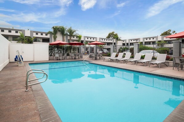Outdoor pool, open 8:00 AM to 10:00 PM, pool umbrellas, sun loungers