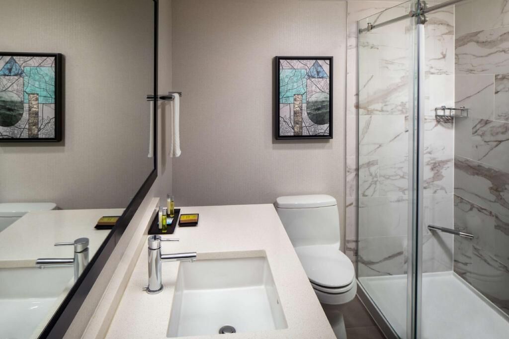 Bathroom | Designer toiletries, hair dryer, towels