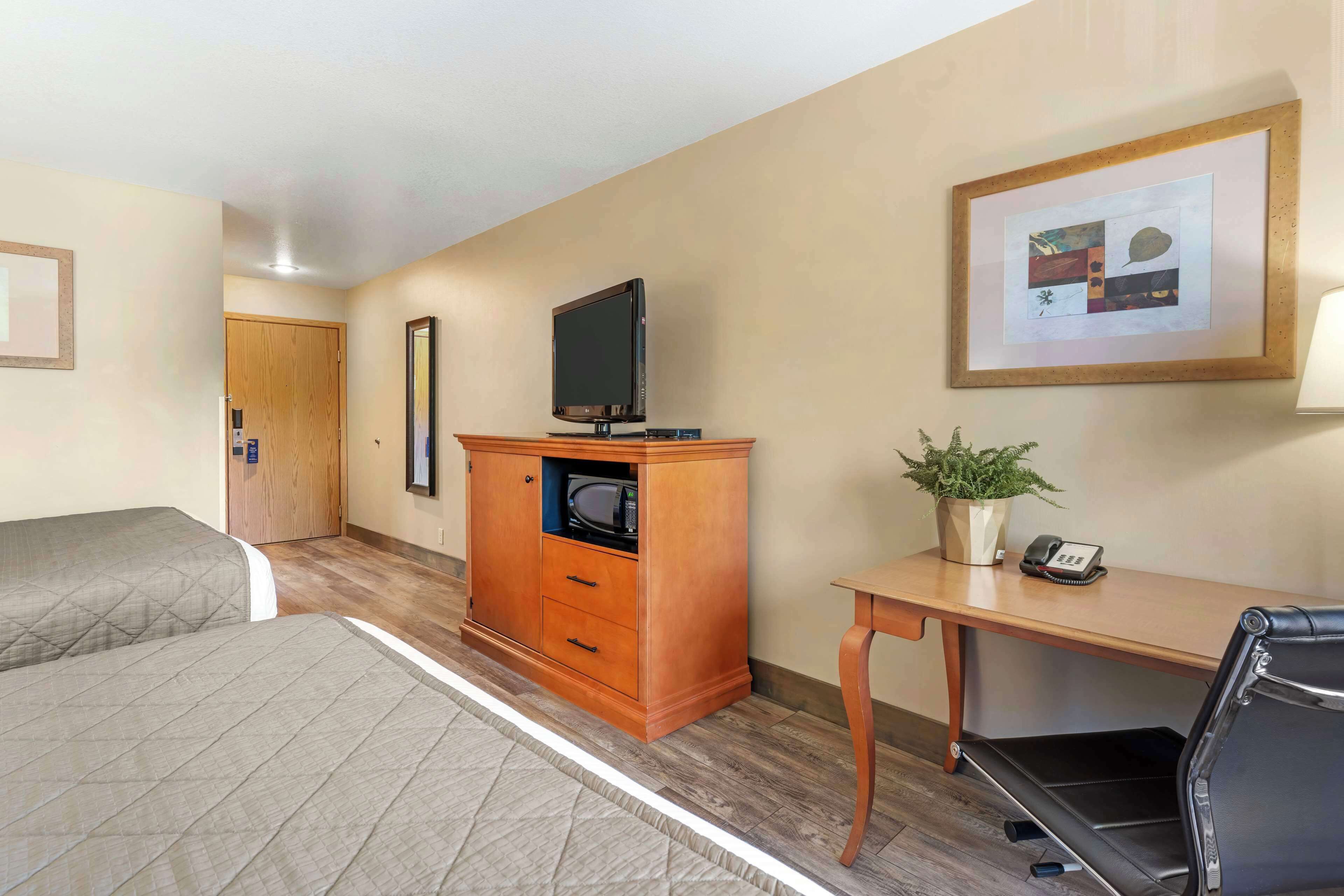 standard room, 2 queen beds, non smoking, refrigerator & microwave | desk, iron/ironing board, free wifi, bed sheets