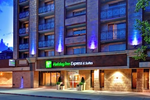 A multi-story hotel with a prominent 'Holiday Inn Express & Suites' sign. - Holiday Inn Express Hotel & Suites Calgary by IHG (Calgary)
