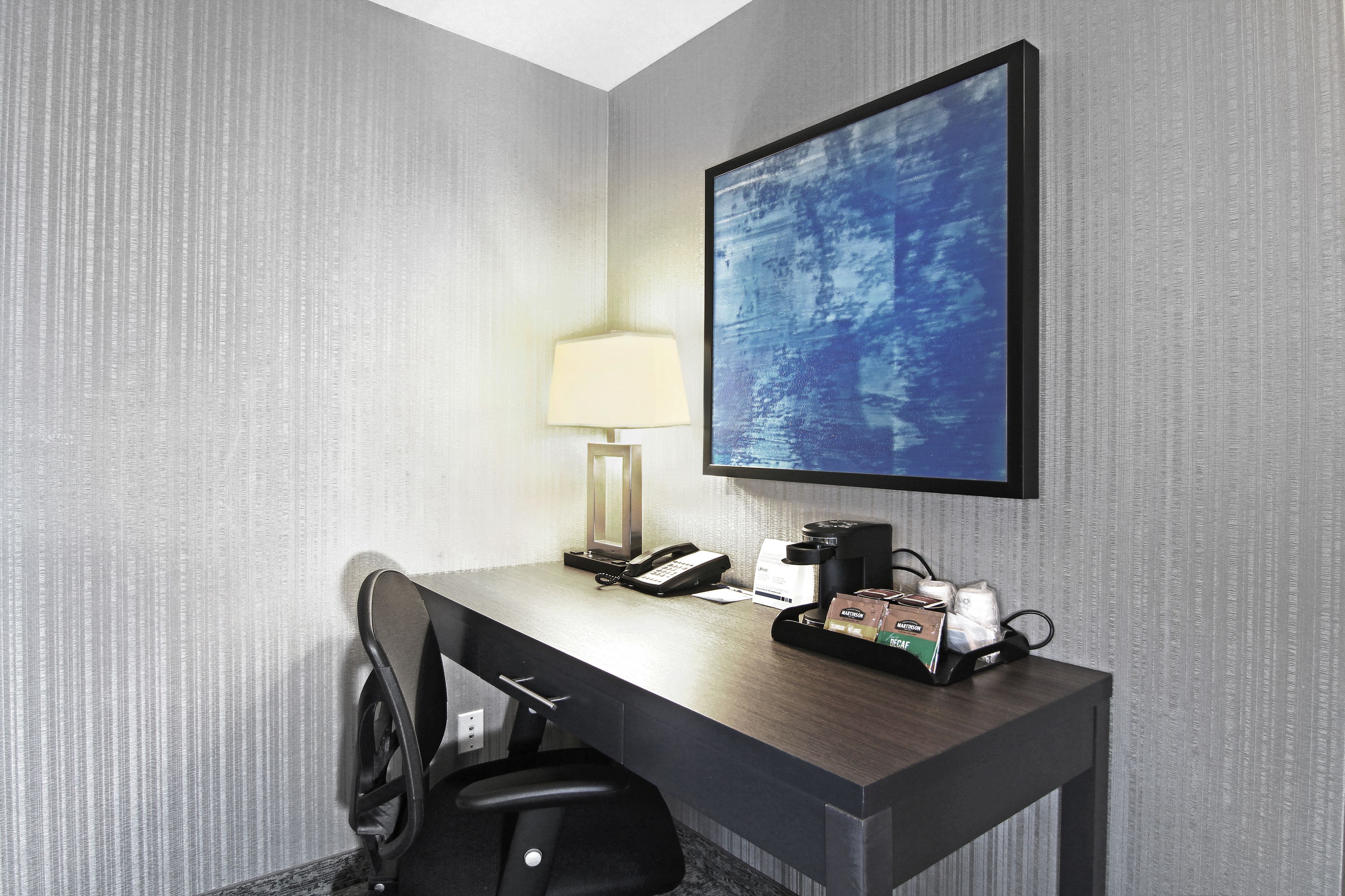 premium bedding, pillow-top beds, desk, blackout curtains