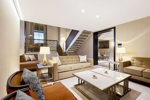 Apartment, 2 Bedrooms | Living area | 55-inch Smart TV with digital channels