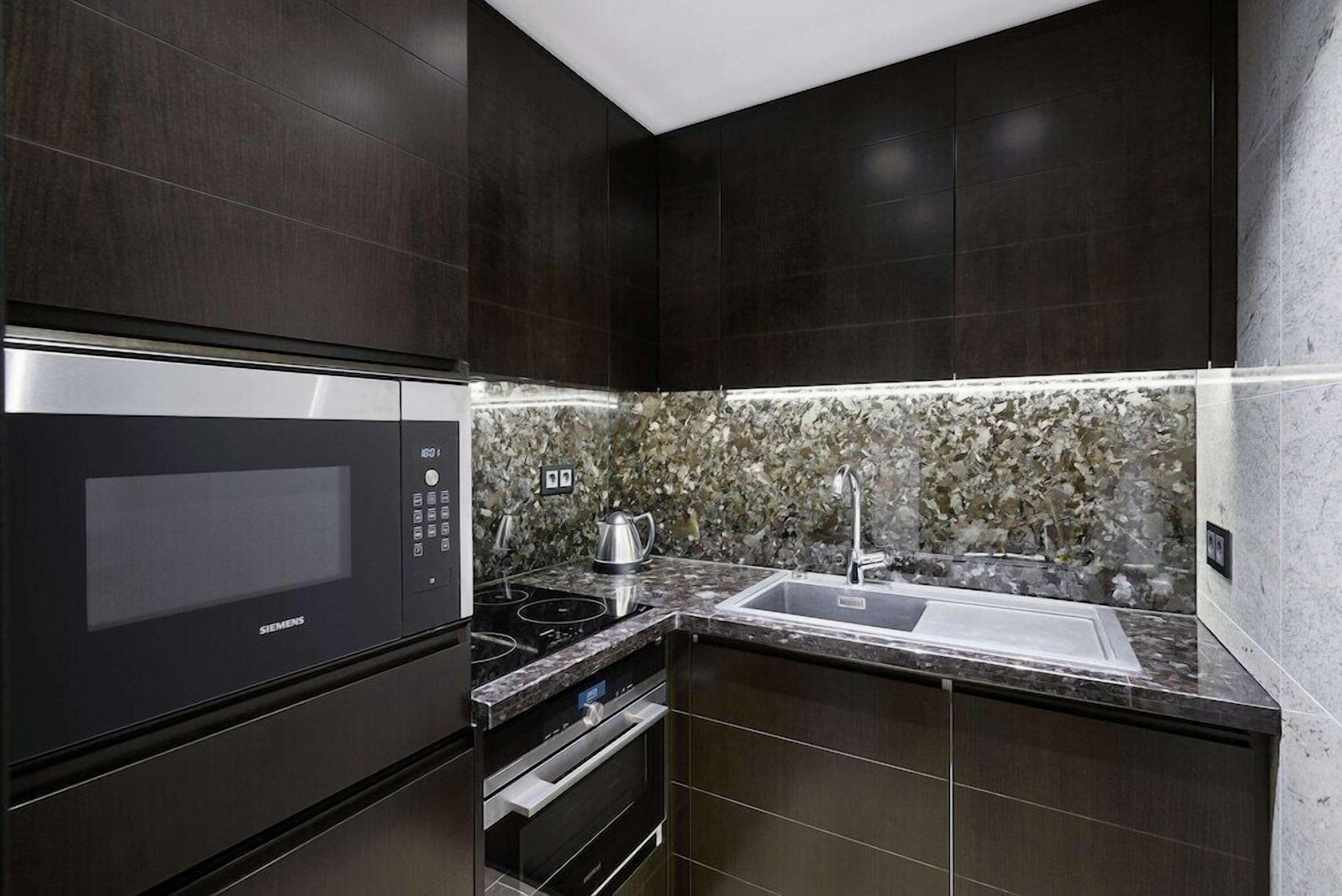 Private kitchen | Espresso maker, electric kettle, high chair