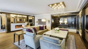 Suite presidencial, 1 cama King size, para no fumadores | Área de sala de estar | Smart TV de 55 pulgadas con canales digitales