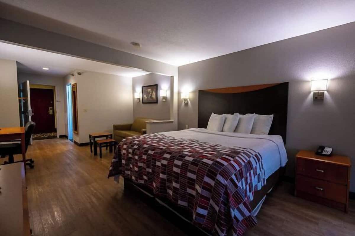 Desk, laptop workspace, blackout curtains, iron/ironing board