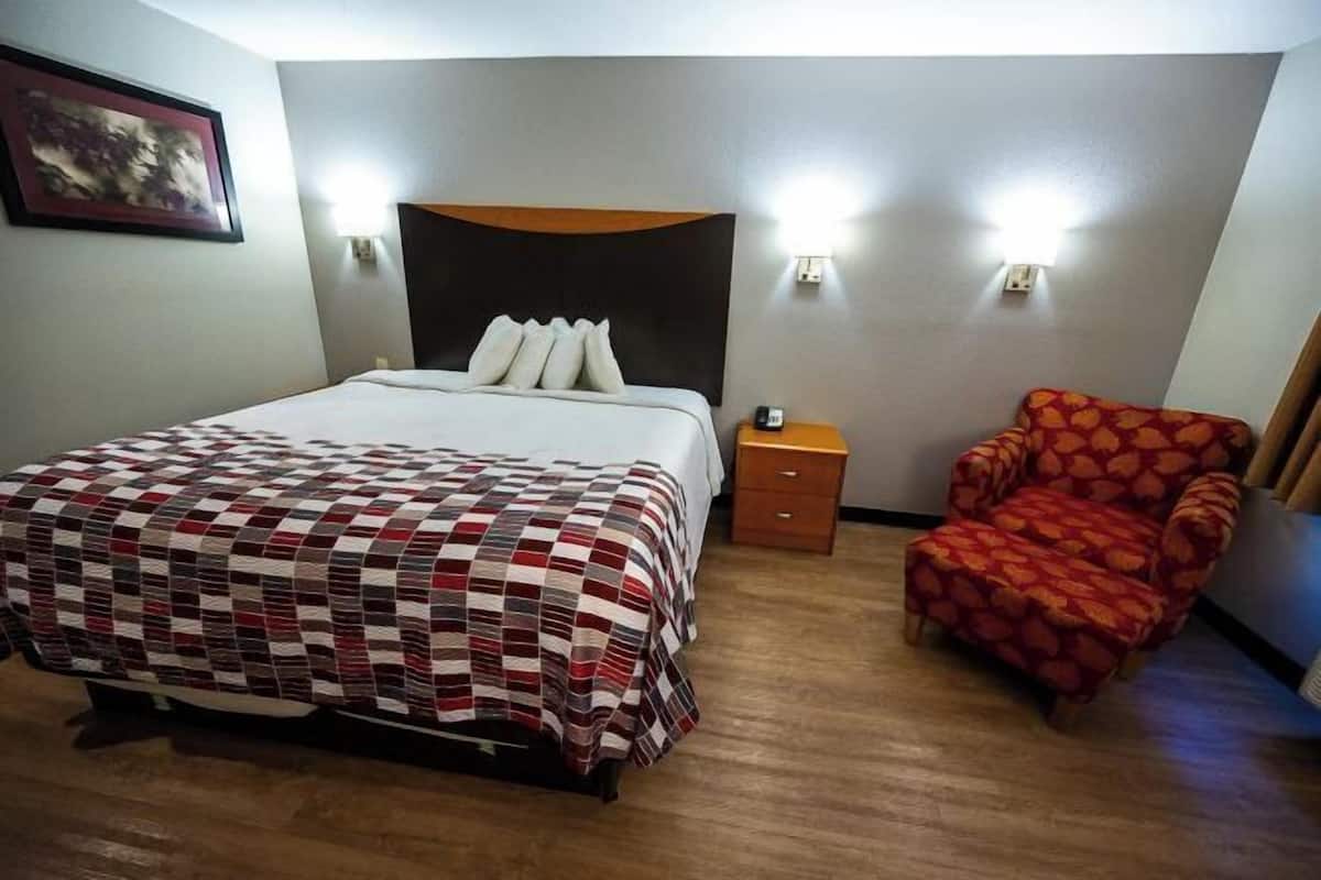 Desk, laptop workspace, blackout curtains, iron/ironing board