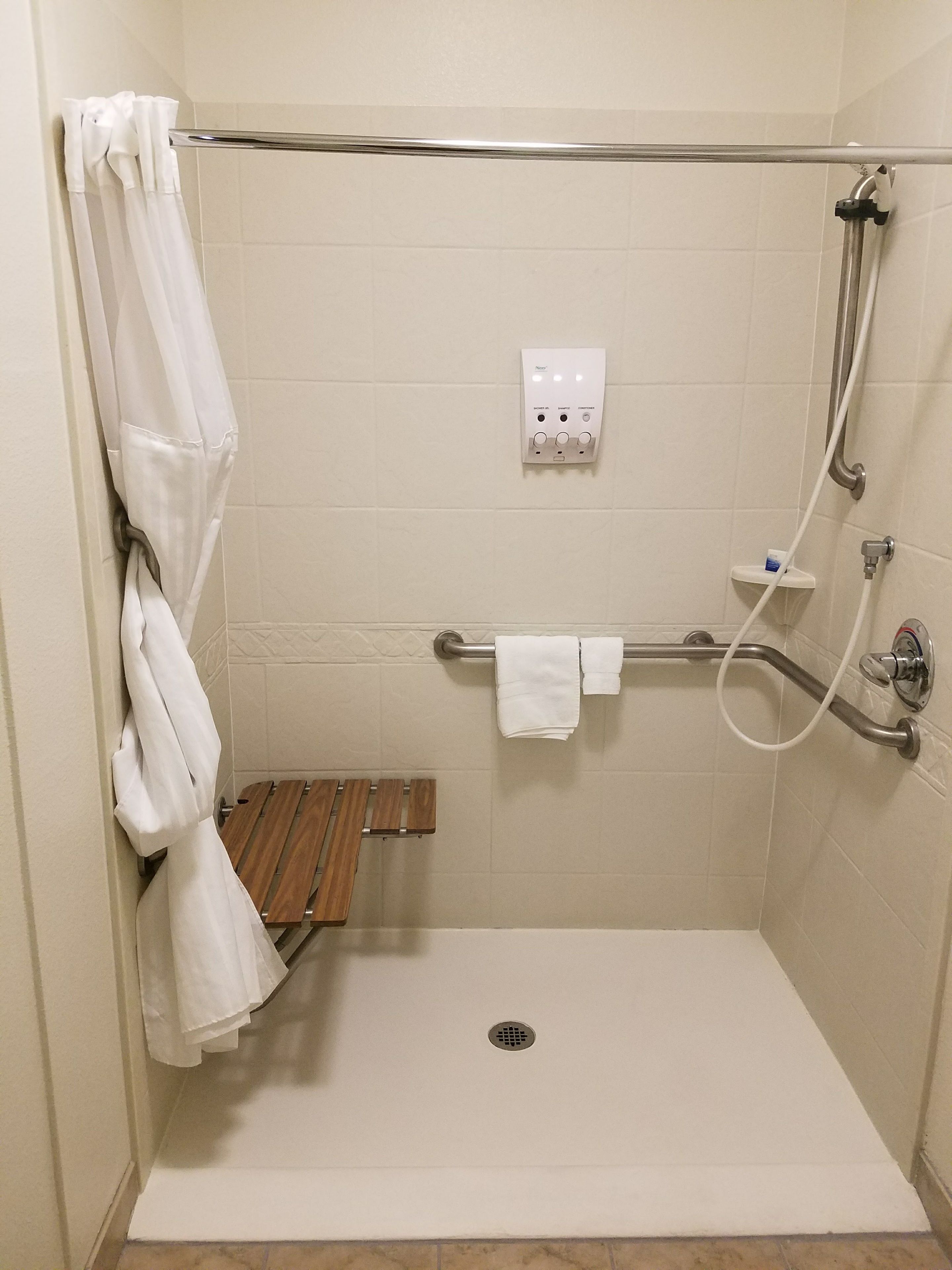 standard room, 2 double beds, accessible, non smoking | bathroom shower