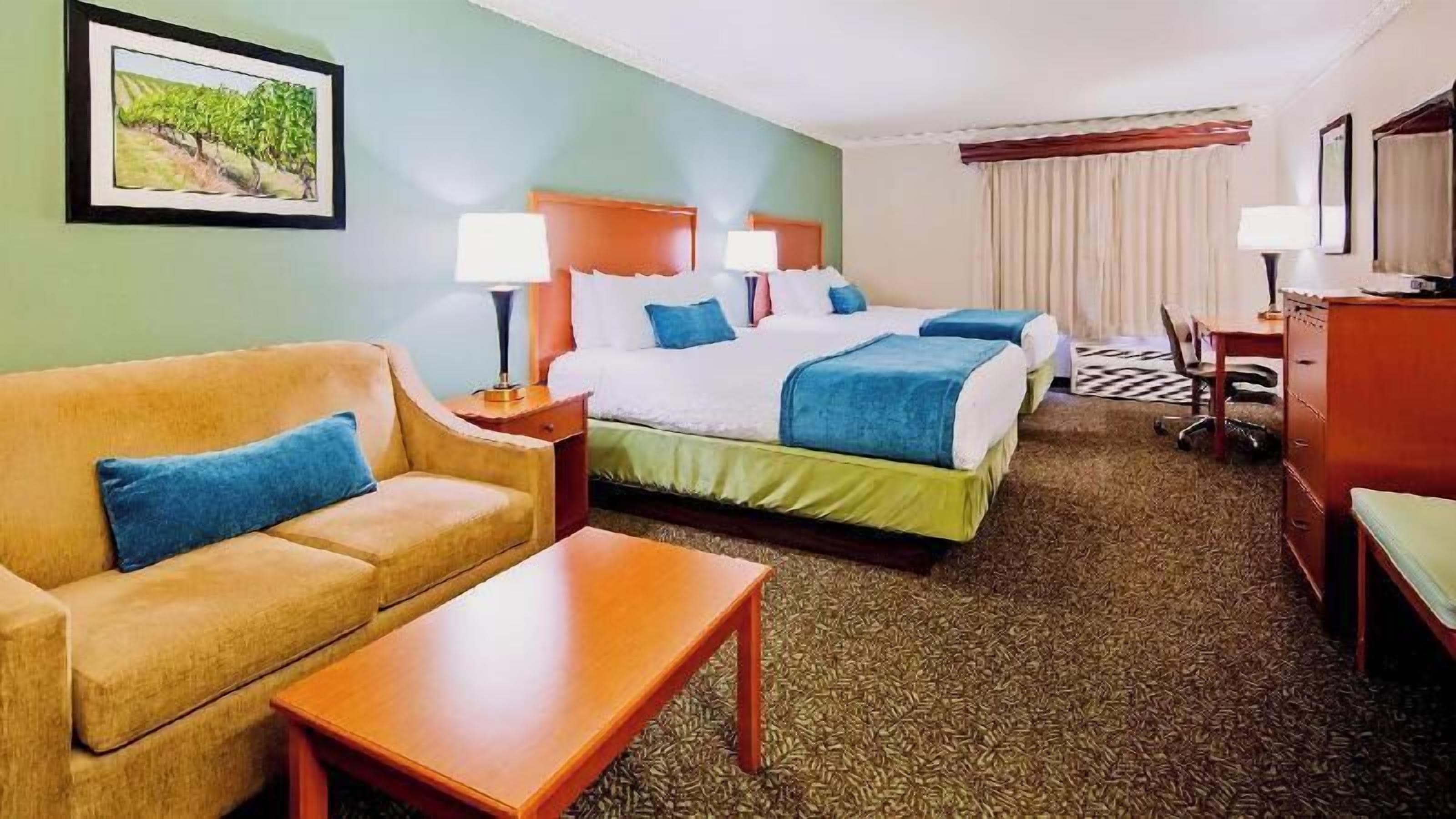 Hypo-allergenic bedding, in-room safe, desk, blackout drapes