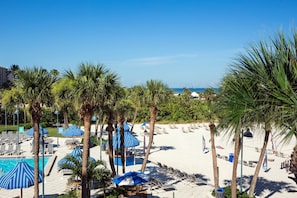 Outdoor pool, open 7:00 AM to 11:00 PM, pool umbrellas, sun loungers