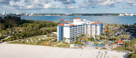 On the beach, beach cabanas, beach towels, beach volleyball