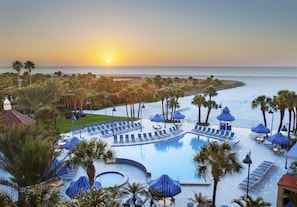Outdoor pool, open 7:00 AM to 11:00 PM, pool umbrellas, pool loungers