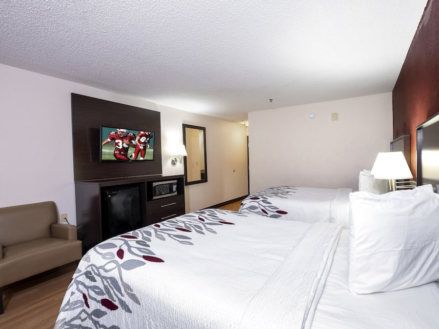 Desk, laptop workspace, blackout drapes, iron/ironing board