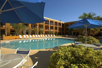 Outdoor pool, sun loungers at Mi Casa Hotel