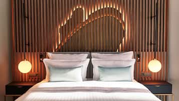 Hypo-allergenic bedding, down duvets, pillow-top beds, minibar