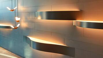 A modern wall with built-in lighting fixtures.