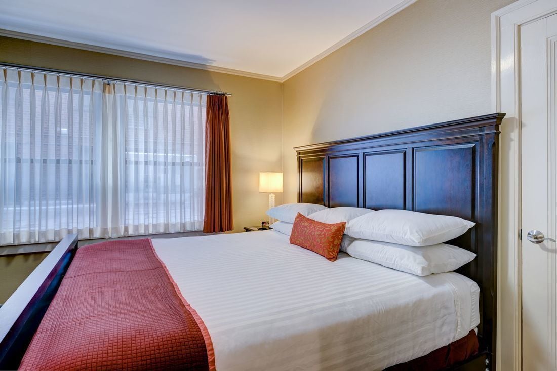 hypo-allergenic bedding, pillow-top beds, desk, blackout curtains