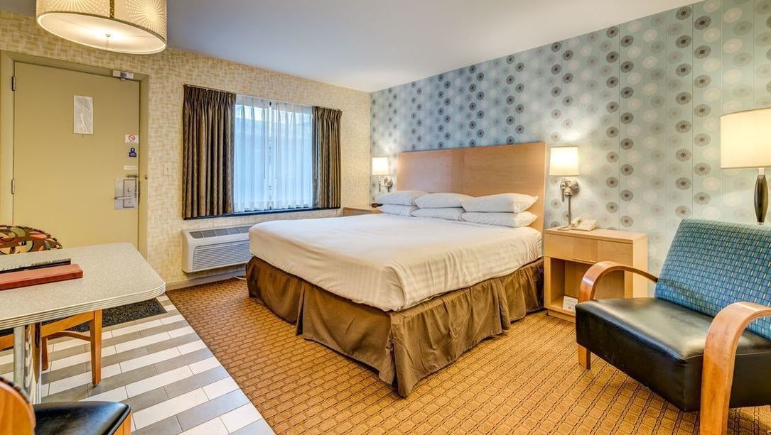 Hypo-allergenic bedding, pillowtop beds, desk, blackout drapes