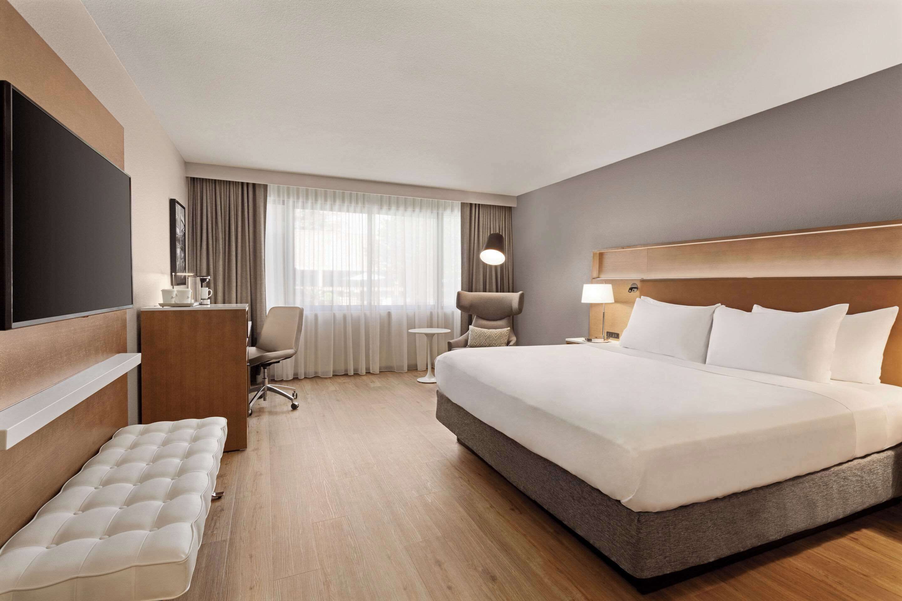 hypo-allergenic bedding, pillow-top beds, desk, laptop workspace