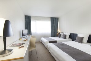 Family Room | Premium bedding, desk, blackout drapes, soundproofing
