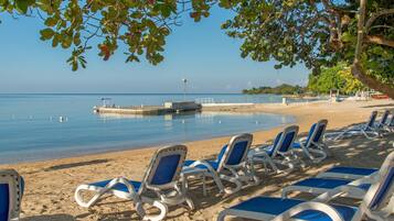Private beach, white sand, sun loungers, beach towels