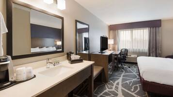 Desk, laptop workspace, blackout drapes, iron/ironing board