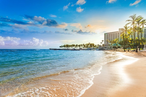 On the beach, beach cabanas, sun-loungers, beach umbrellas