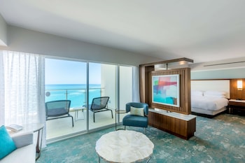 Presidential Room, 2 Bedrooms, Ocean View | Living area | 27-inch LCD TV with cable channels, TV, pay movies at Caribe Hilton