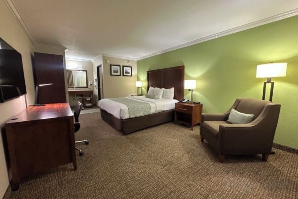 Down duvets, pillow-top beds, in-room safe, desk