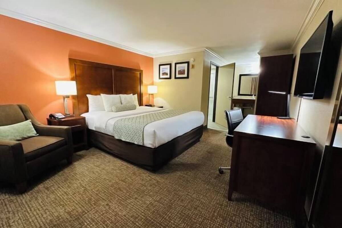 Down comforters, pillowtop beds, in-room safe, desk