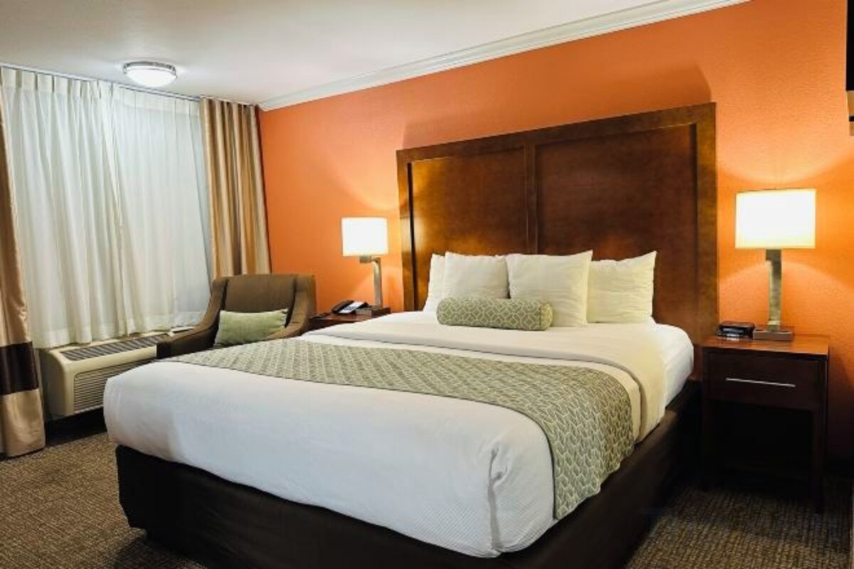 Down duvets, pillow-top beds, in-room safe, desk