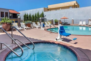 Outdoor pool, open 9:00 AM to 9:00 PM, sun loungers