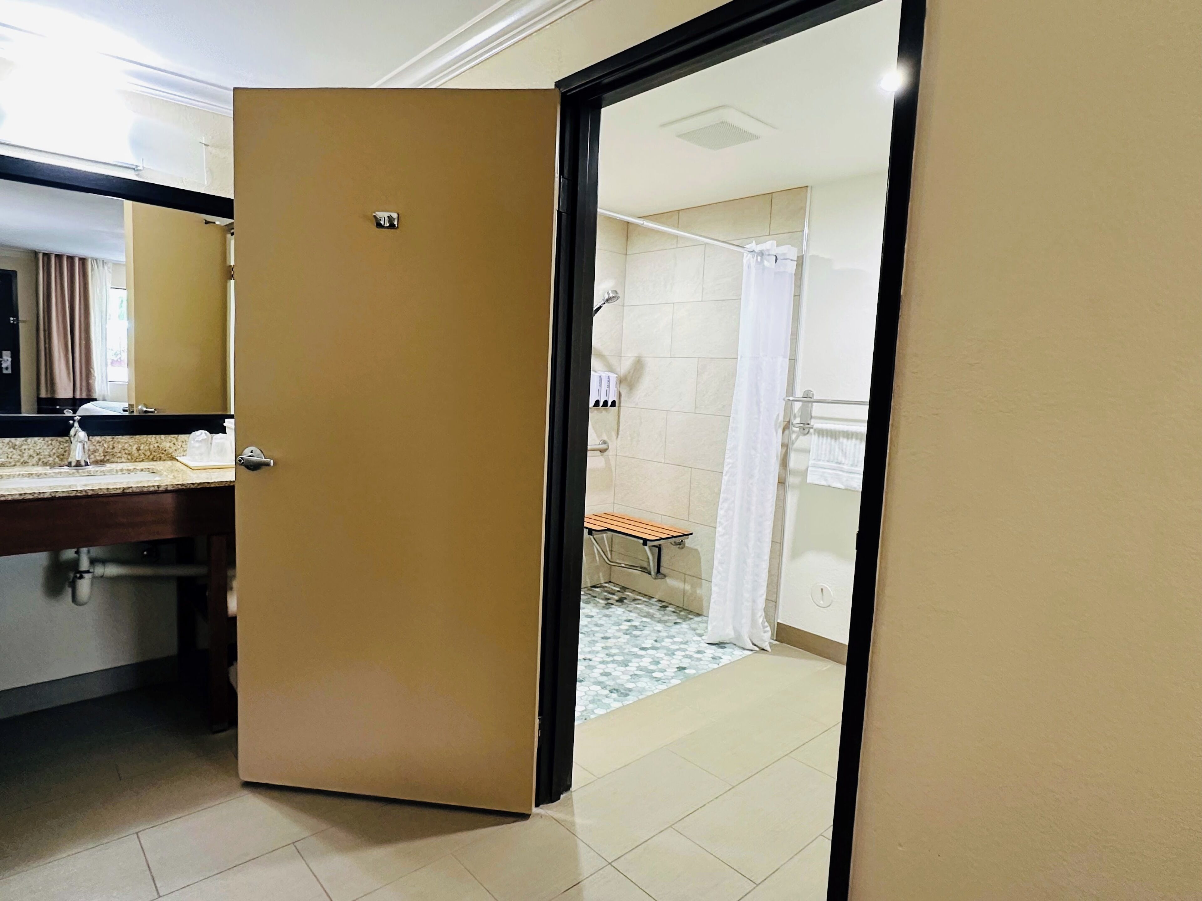 standard room, 1 king bed, mobility accessible | bathroom | eco-friendly toiletries, hair dryer, towels, soap