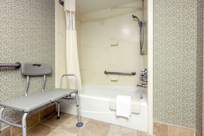 One King Bed, Non-Smoking | Bathroom | Combined shower/tub, free toiletries, hair dryer, towels