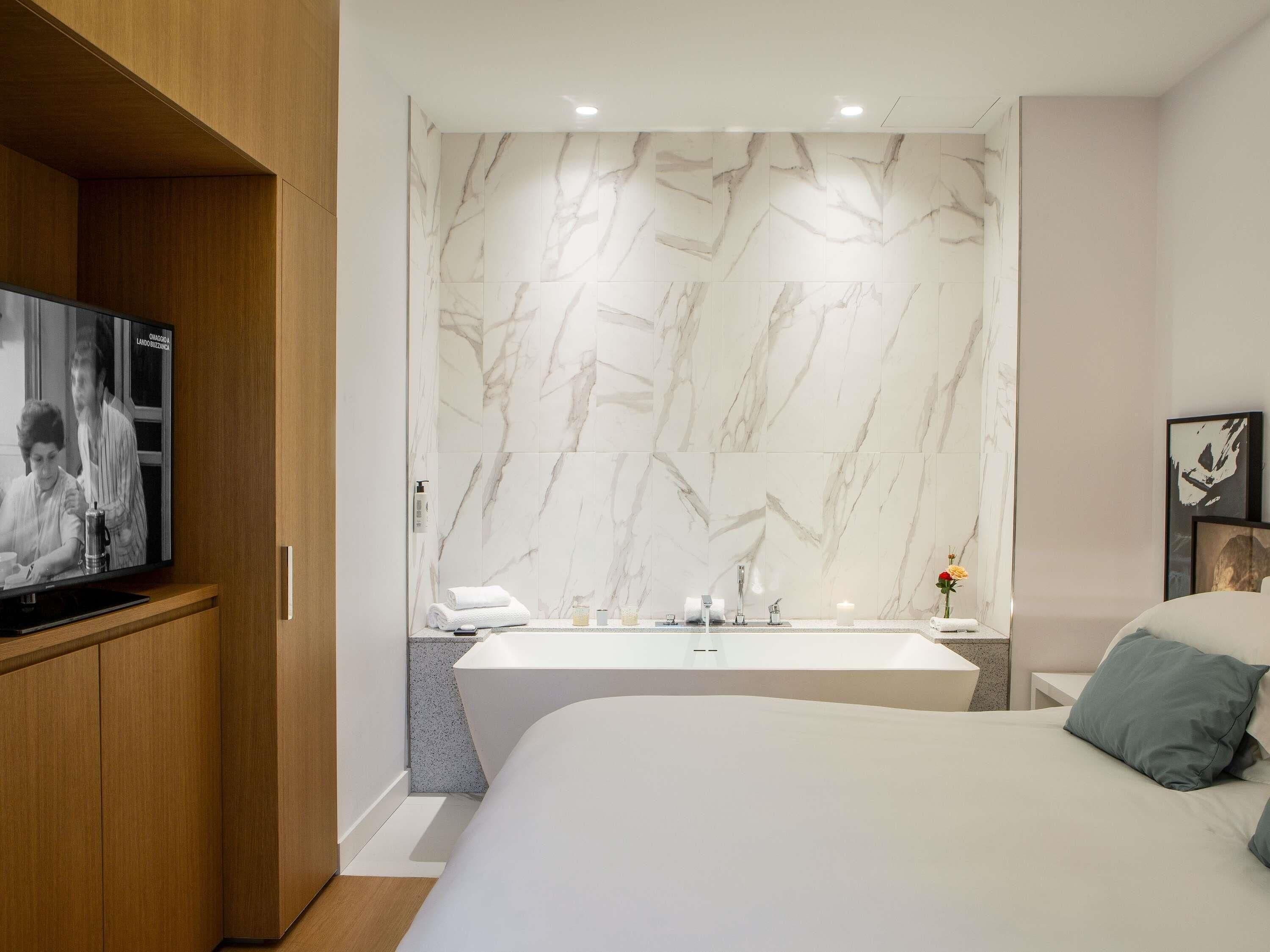 Suite Junior, 1 grand lit | Literie de qualité supérieure, minibar, coffres-forts dans les chambres
