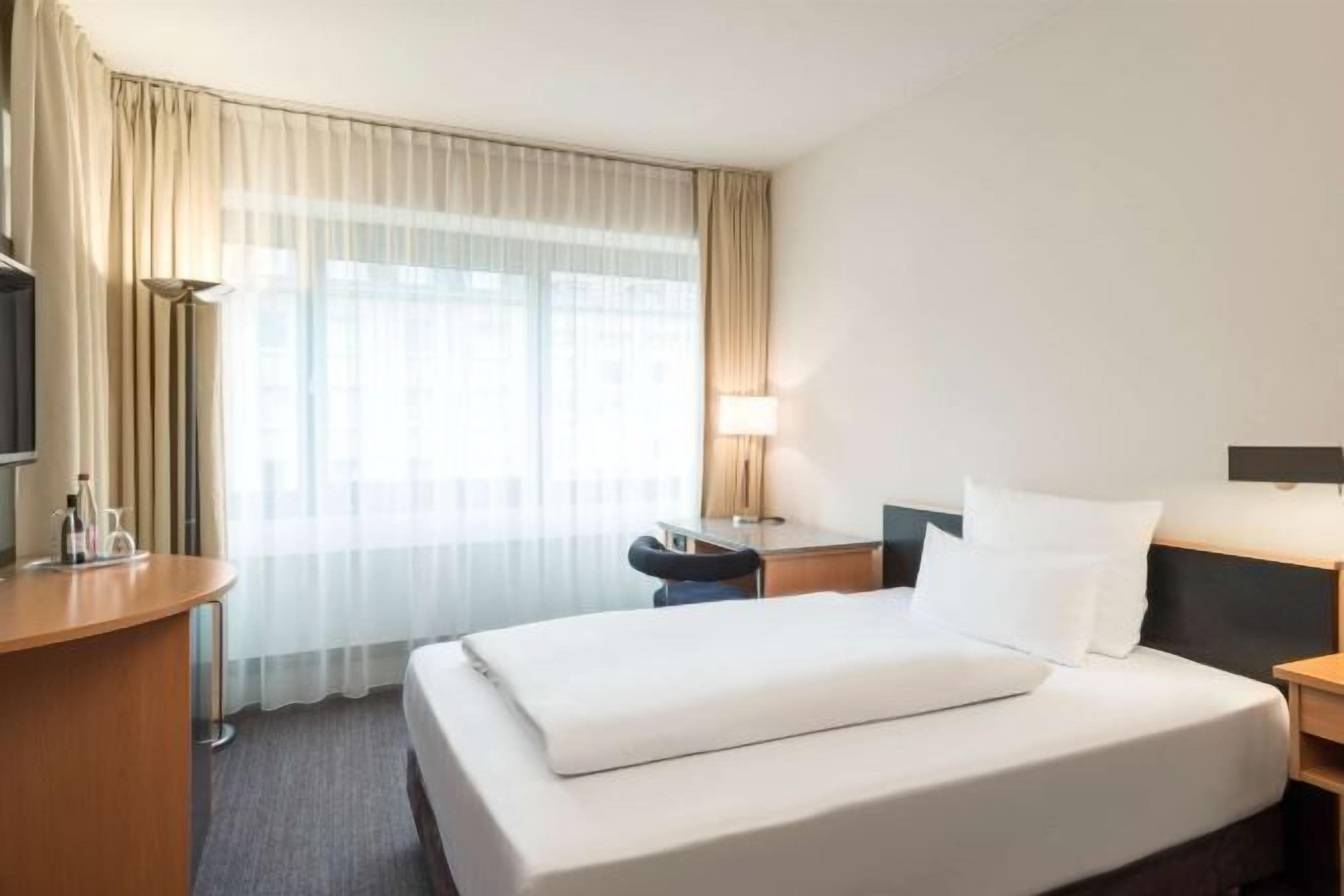 Premium bedding, pillow-top beds, minibar, in-room safe