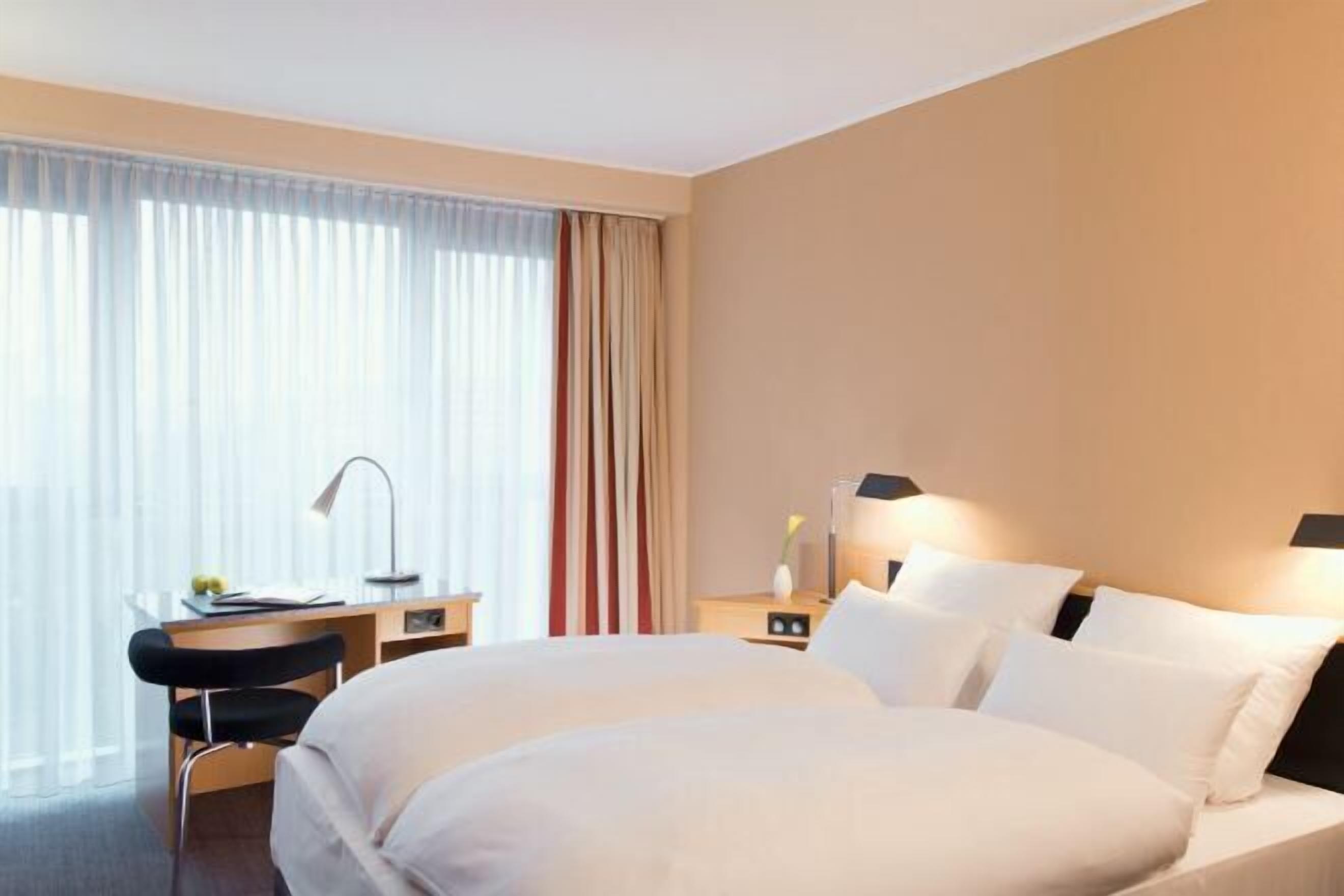 Premium bedding, pillow-top beds, minibar, in-room safe