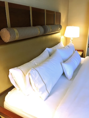 Premium bedding, down comforters, pillowtop beds, in-room safe
