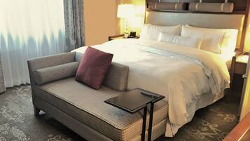 Premium bedding, down comforters, pillowtop beds, in-room safe