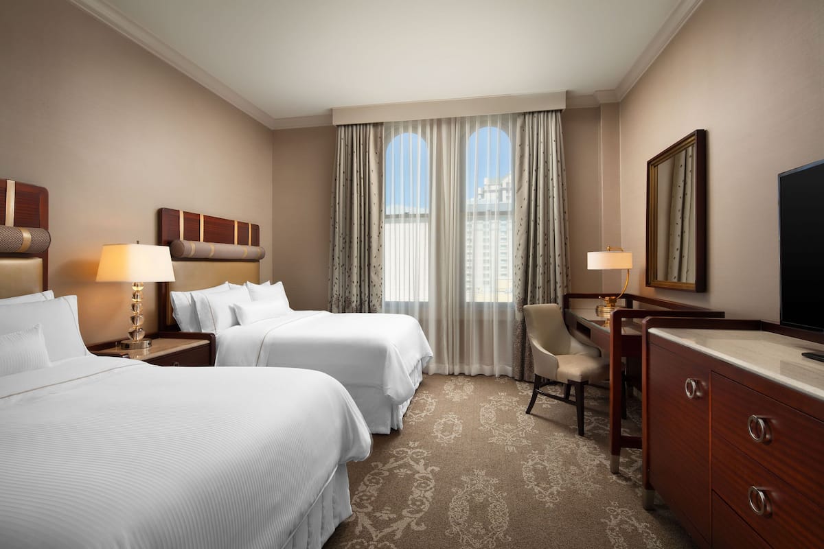 Premium bedding, down comforters, pillowtop beds, in-room safe