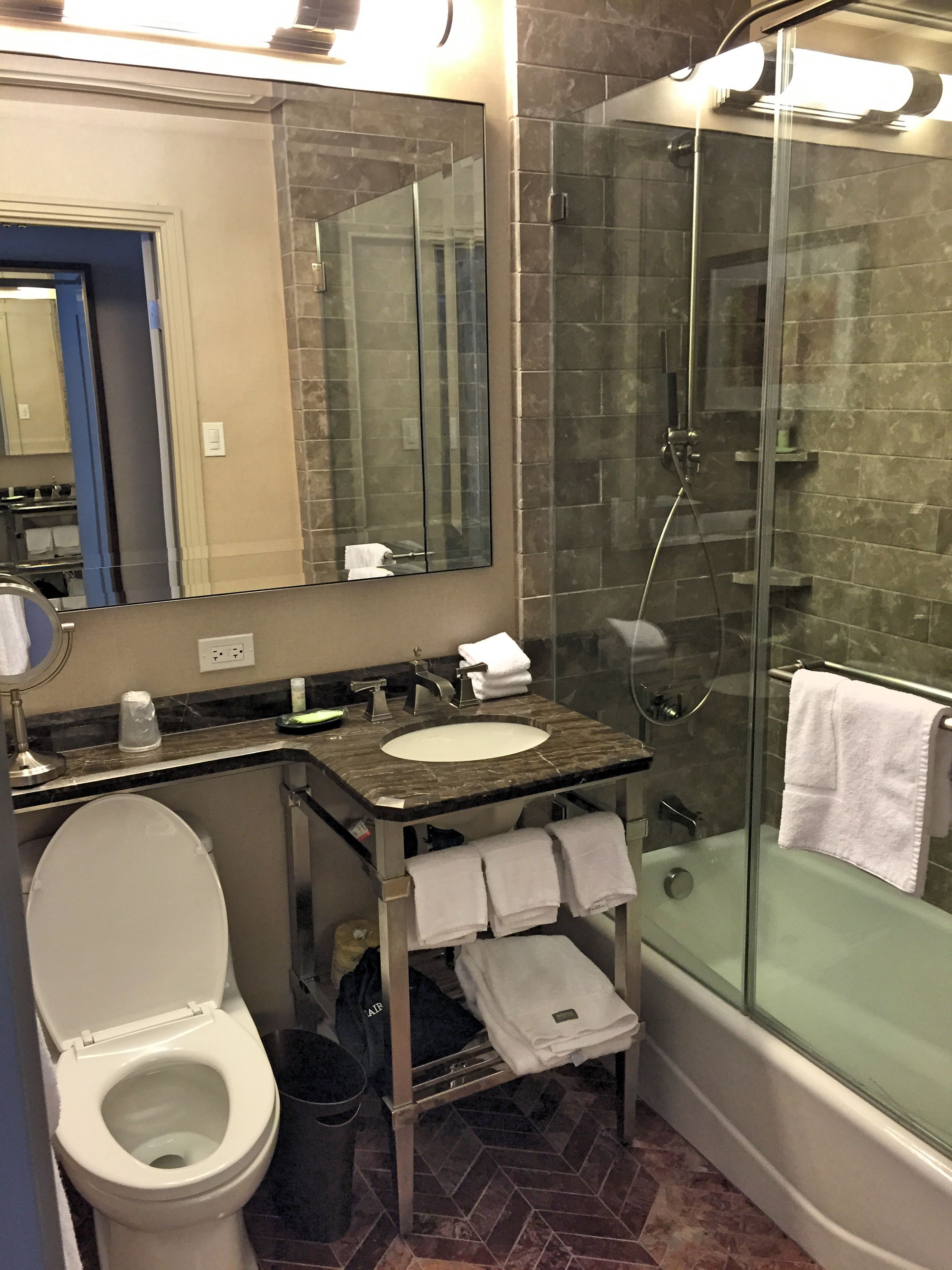 shower, rainfall showerhead, designer toiletries, hair dryer